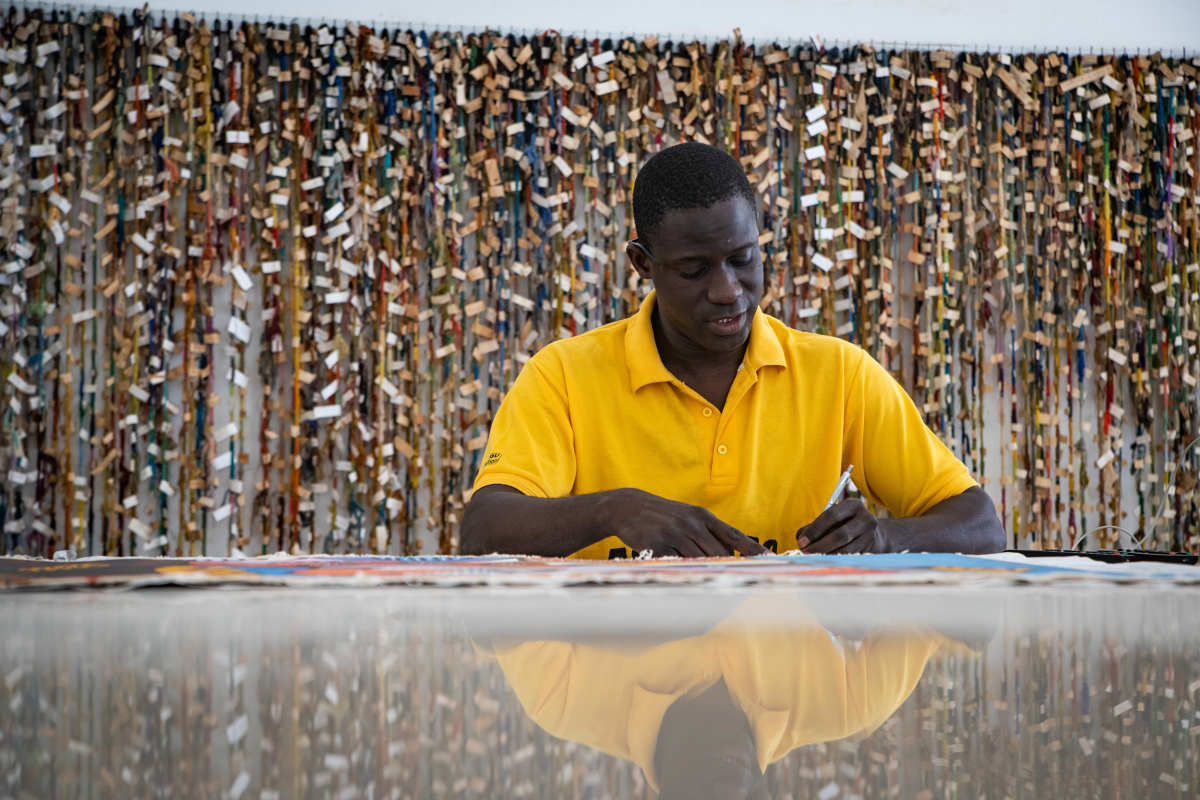 Interior of the tapestry workshop in Thiès, Senegal, where master artisans create world-renowned handwoven African tapestries.